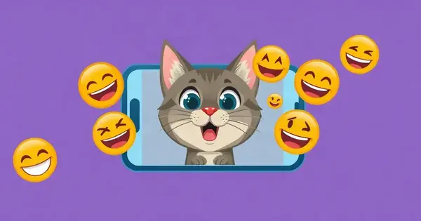 Удивлённый кот на экране смартфона в окружении смеющихся смайликов